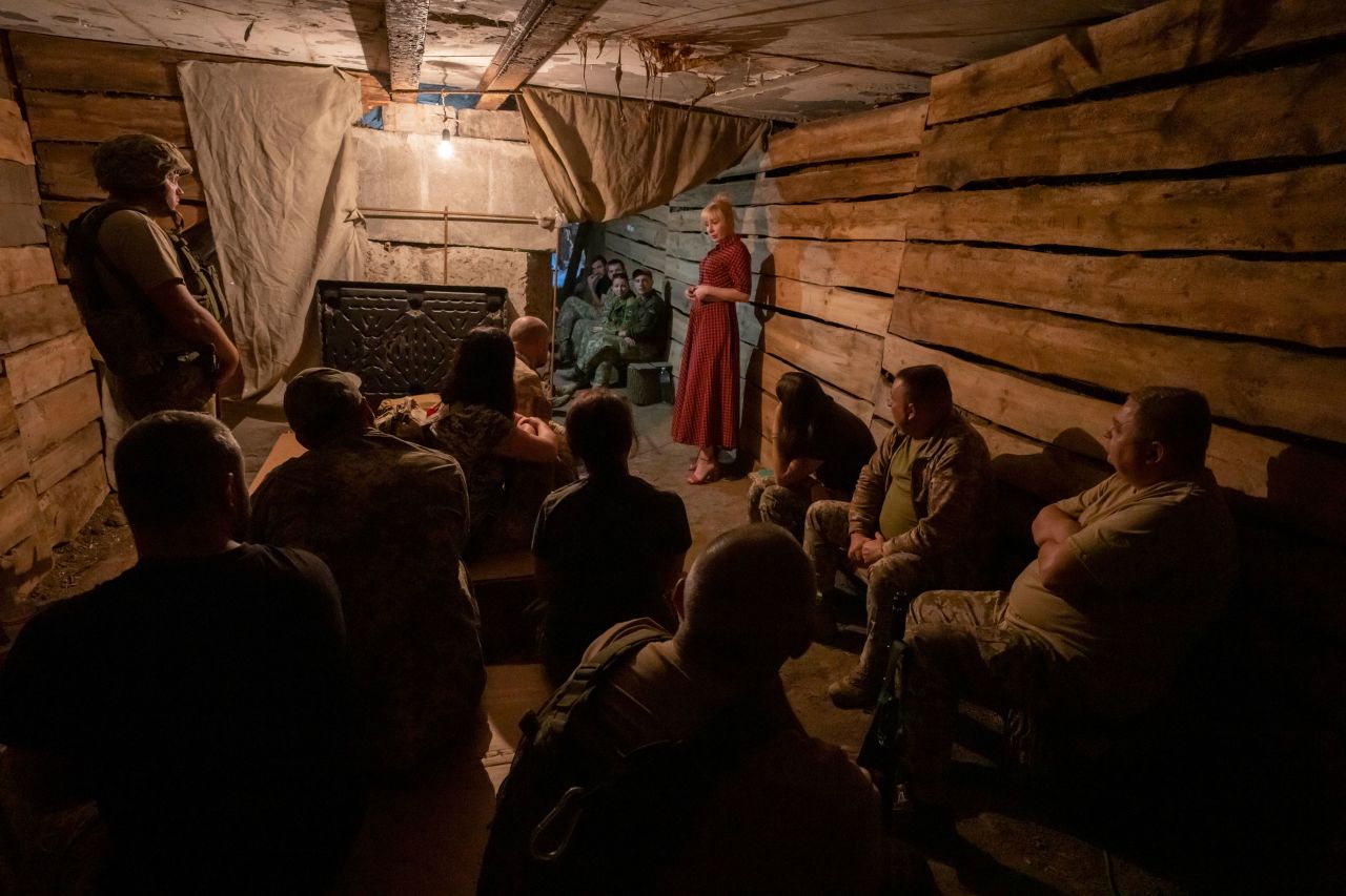 Medic volunteer Nataliia Voronkova gives a medical tactical training session to soldiers in a bomb shelter as air raid sirens go off in Dobropillia, Ukraine, on Friday, July 22.