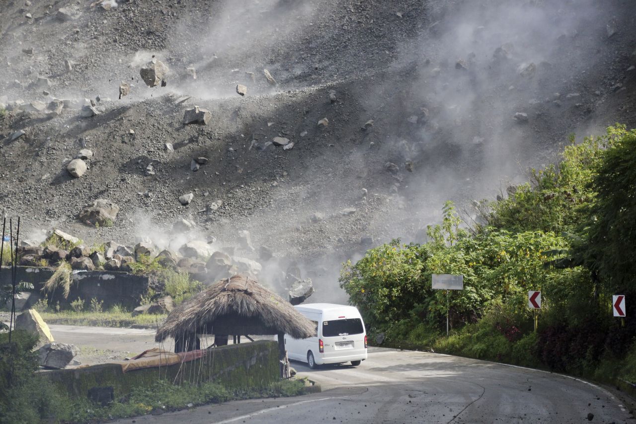 Boulders fall near a vehicle in Bauko, Philippines, during an earthquake on Wednesday, July 27. At least five people died and 130 others were injured after <a href="https://www.cnn.com/2022/07/26/asia/philippines-luzon-earthquake-intl-hnk/index.html" target="_blank">a 7.0-magnitude quake</a> struck the northern Philippines on Wednesday, according to authorities in the Southeast Asian country.