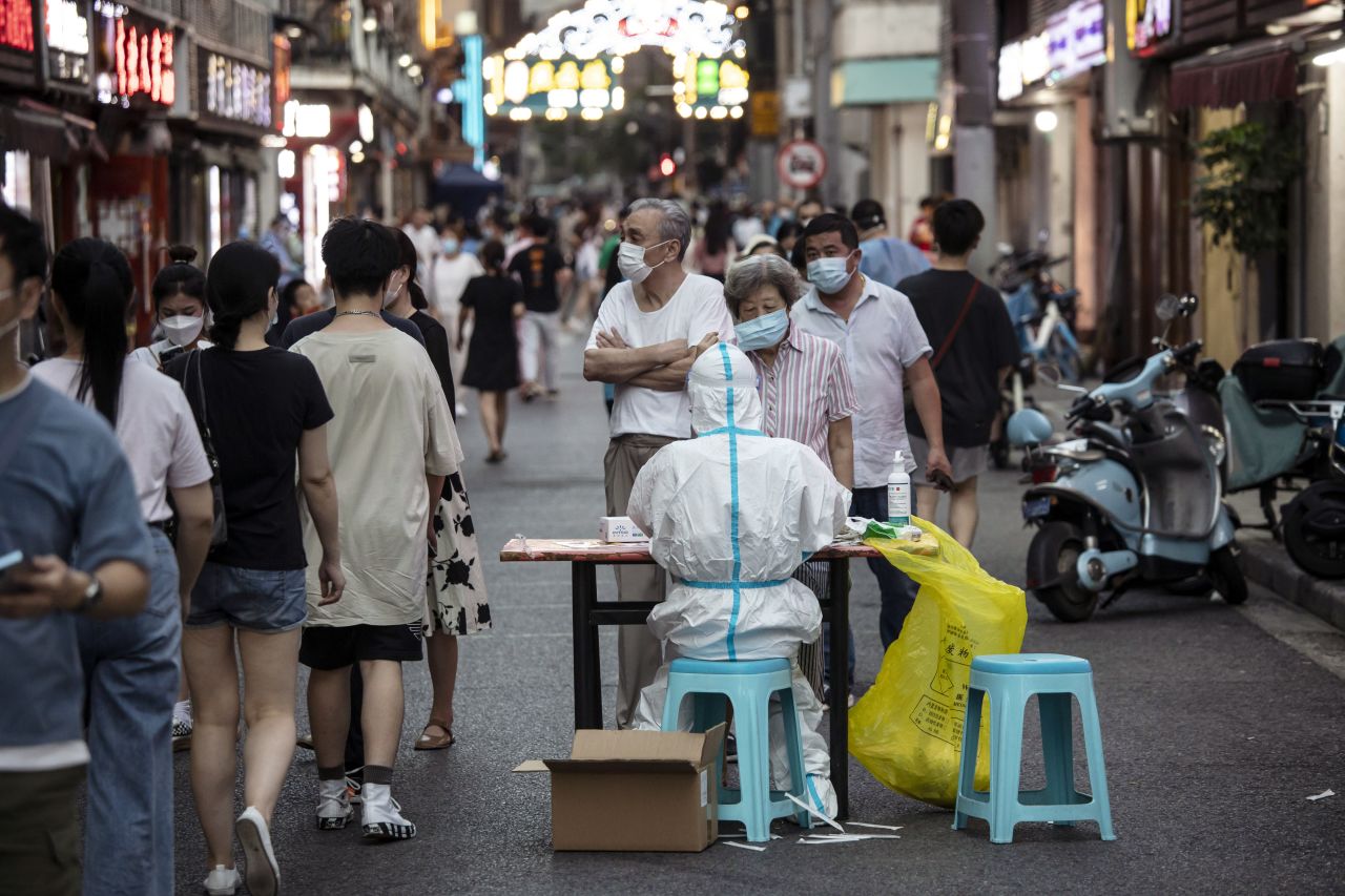 People line up at a Covid-19 testing station in Shanghai, China, on Saturday, July 23. The highly transmissible BA.5 variant <a href="https://www.cnn.com/2022/07/13/china/china-covid-shanghai-lockdown-heat-wave-intl-hnk/index.html" target="_blank">is spreading rapidly worldwide</a> and is seen as a great threat by authorities in <a href="https://www.cnn.com/china" target="_blank">China</a> — the last major country adhering to a stringent zero-Covid strategy.