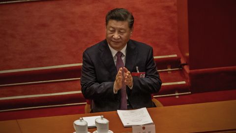 Chinese President Xi Jinping claps hands during the Second Plenary Session of the Fifth Session of the 13th National People's Congress on March 08, 2022, at the Great Hall of the People, in Beijing, China. 