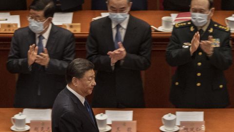 Chinese President Xi Jinping (bottom) is applauded by members of the government as he arrives for the closing session of the Chinese People's Political Consultative Conference (CPPCC) at the Great Hall of the People on March 10, 2022 in Beijing, China. China's week-long annual political gathering, known as the Two Sessions, convenes the nation's leaders and lawmakers to set the government's agenda for domestic economic and social development for the next year. 