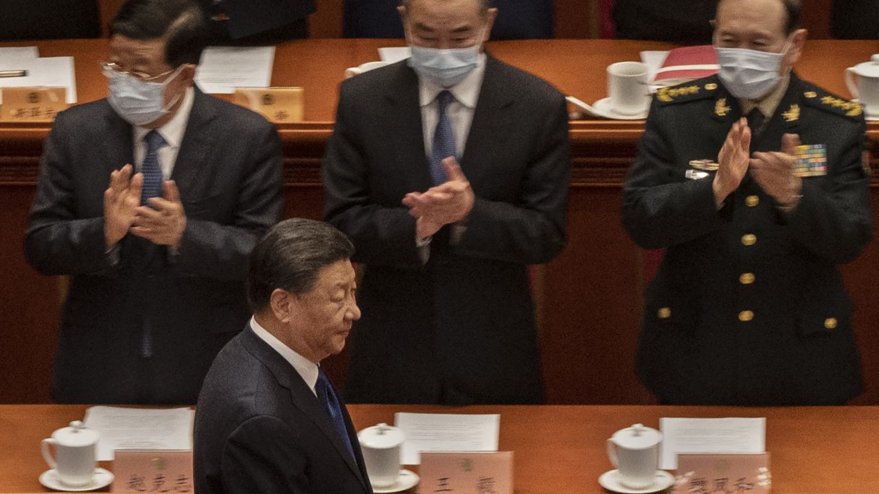Chinese President Xi Jinping (bottom) is applauded by members of the government as he arrives for the closing session of the Chinese People's Political Consultative Conference (CPPCC) at the Great Hall of the People on March 10, 2022 in Beijing, China. China's week-long annual political gathering, known as the Two Sessions, convenes the nation's leaders and lawmakers to set the government's agenda for domestic economic and social development for the next year.