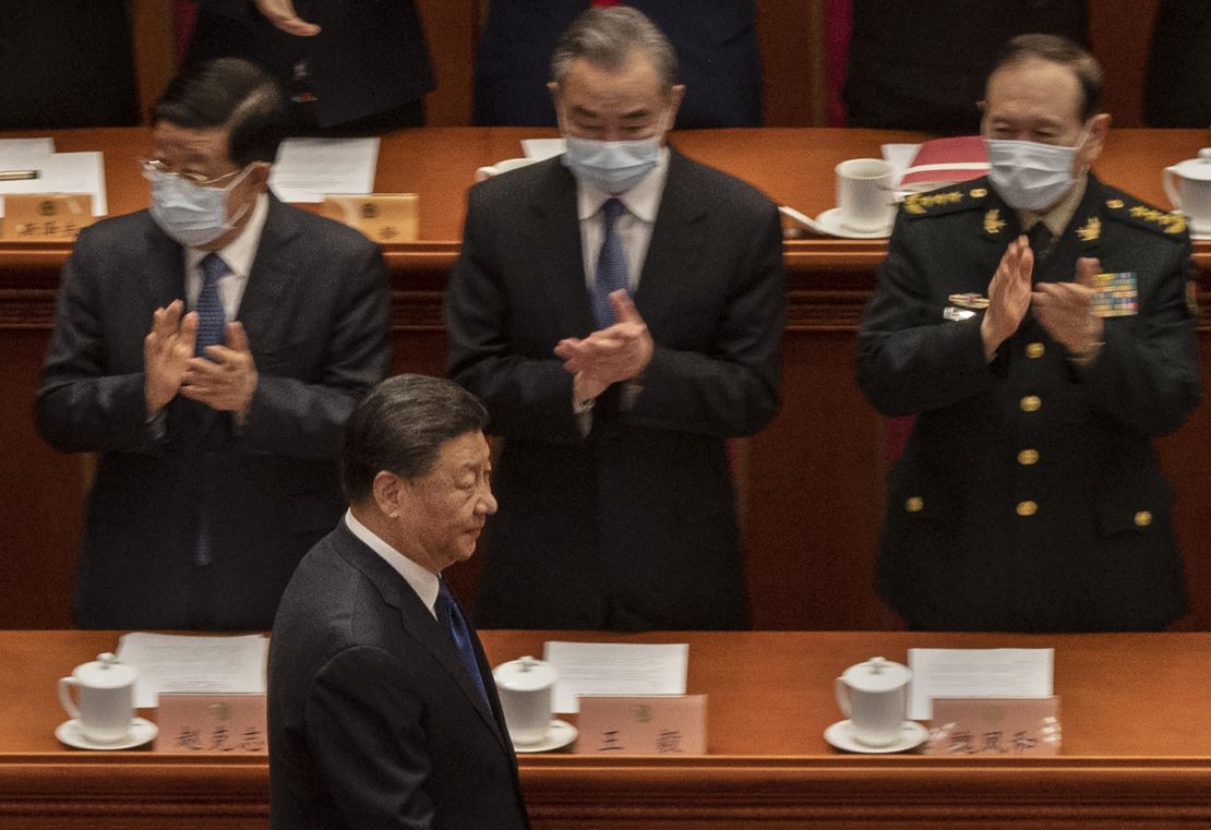 Chinese President Xi Jinping (bottom) is applauded by members of the government as he arrives for the closing session of the Chinese People's Political Consultative Conference (CPPCC) at the Great Hall of the People on March 10, 2022 in Beijing, China. China's week-long annual political gathering, known as the Two Sessions, convenes the nation's leaders and lawmakers to set the government's agenda for domestic economic and social development for the next year. 