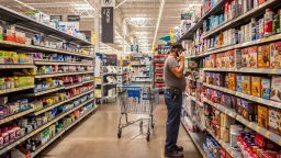 A customer shops for nutrition products in a Walmart Supercenter on July 8, 2022 in Houston, Texas. Consumer goods continue seeing shortages as the country grapples with ongoing supply chain issues stemming from the pandemic.  