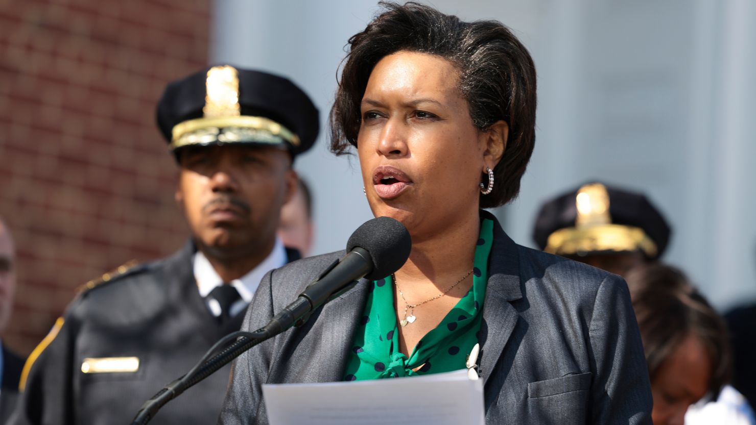 Washington, DC Mayor Muriel Bowser and Washington Metropolitan Police Chief Robert Contee III speak at a news conference on March 15, 2022 in Washington.