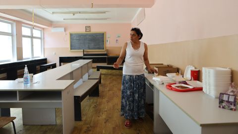Ala Valentinovna Saviena prepares meals in the shelter in Chisinau.