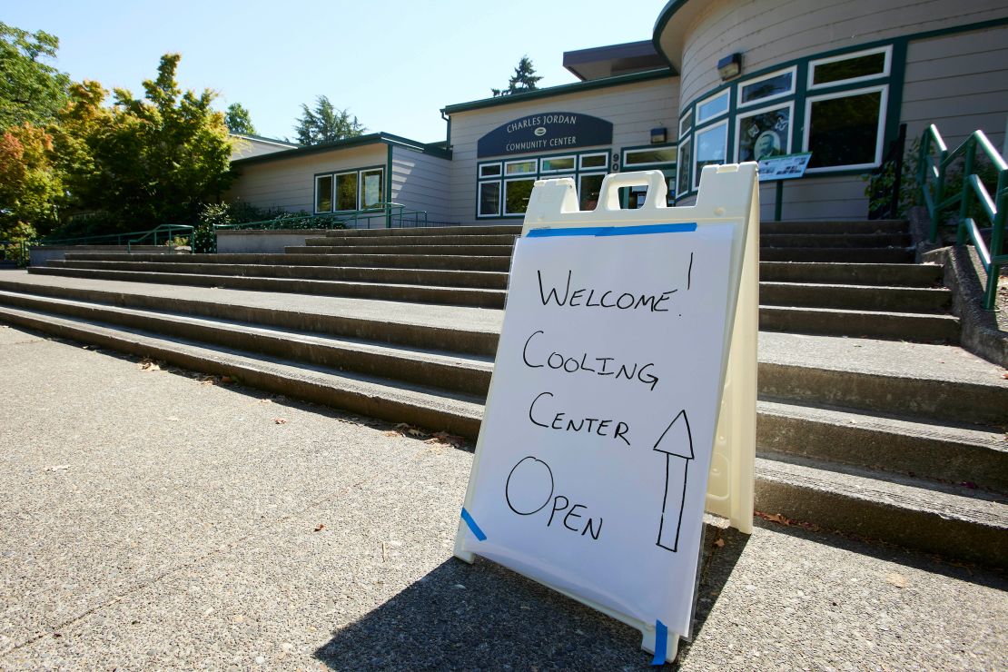 A sign showing that a cooling center at the Charles Jordan Community Center is open is shown in Portland, Oregon.
