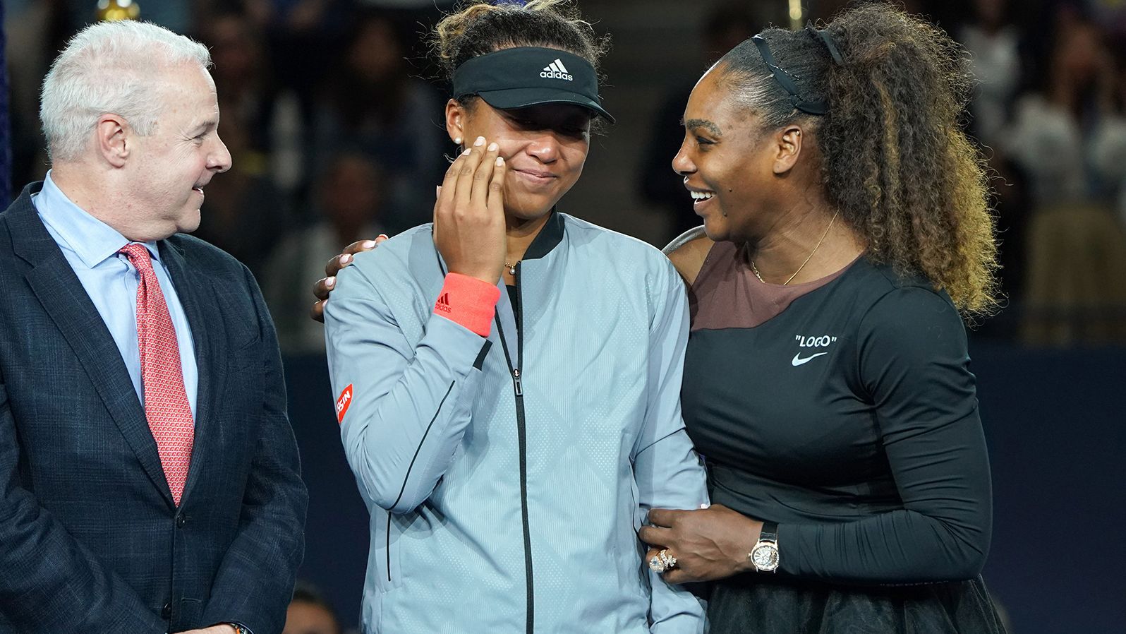 Williams consoles Osaka, who was in tears after her US Open win in 2018. Osaka had denied her idol of a 24th grand slam title, and <a href="index.php?page=&url=https%3A%2F%2Fwww.cnn.com%2F2018%2F09%2F11%2Ftennis%2Fnaomi-osaka-serena-williams-us-open-spt-intl" target="_blank">fans were booing</a> after Williams had clashed with the chair umpire during the match.