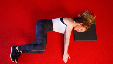 The knees and hips should stay aligned and stacked to help maintain stability in your lower back.