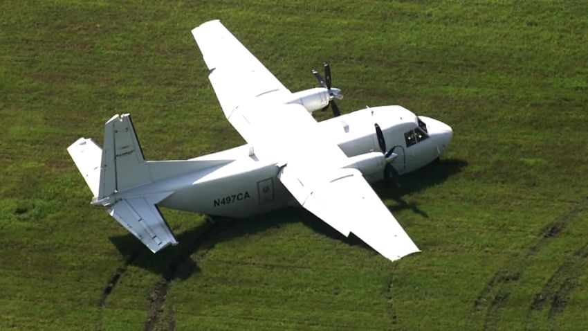 the FAA said a twin-engine CASA CN-212 Aviocar landed in the grass at Raleigh-Durham International Airport between Runway 23L and 23R around 240pET. According to the FAA, two people were on board the plane when it took off, however a spokesperson for Raleigh-Durham International Airport told CNN affiliate WRAL that only the pilot was on board when it landed at the airport. WRAL  MS 18475879