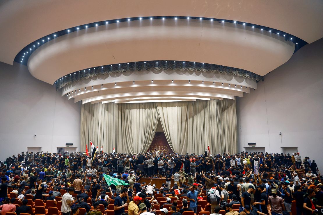 Demonstrators, seen here on July 30, have breached Baghdad's heavily fortified Green Zone for the second time this week.