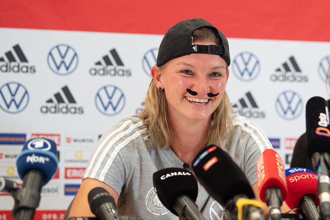 Alexandra Popp wore a fake mustache to her pre-match press conference on Friday.