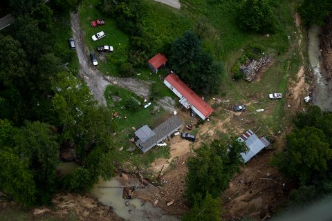 Flood damage is visible as the Kentucky National Guard flies over Buckhorn, Kentucky on Saturday.