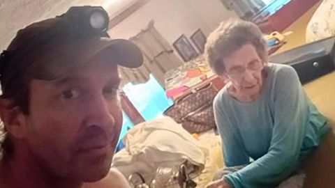 Gregrory Amburgey was seen with his 98-year-old Grandma Mae when their home flooded in eastern Kentucky.