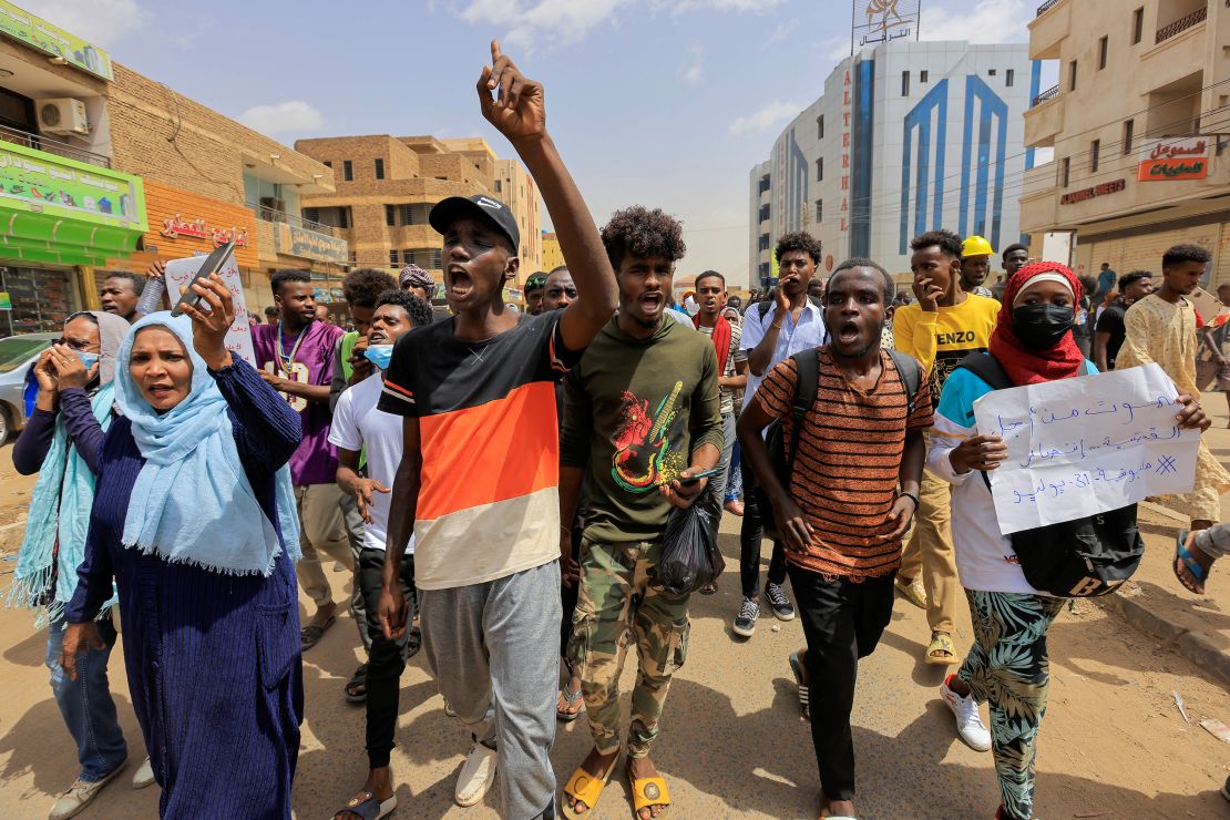 Protesters march during a rally against military rule following the last coup, in Khartoum, Sudan, on July 31, 2022. 