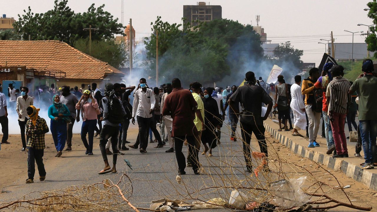 Protesters march during a rally against military rule following the last coup, in Khartoum, Sudan, on July 31, 2022. 