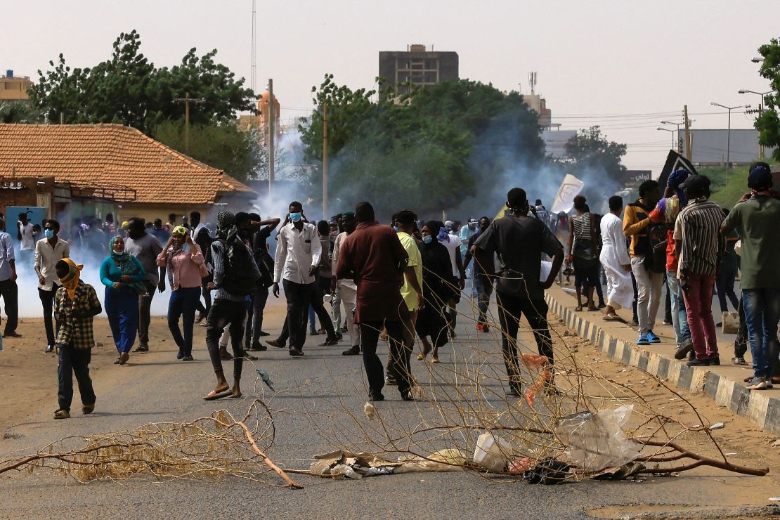 Protesters march during a rally against military rule following the last coup, in Khartoum, Sudan, on July 31, 2022. 