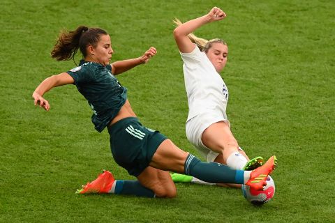 Lena Oberdorf of Germany is challenged for the ball by Alessia Russo of England.