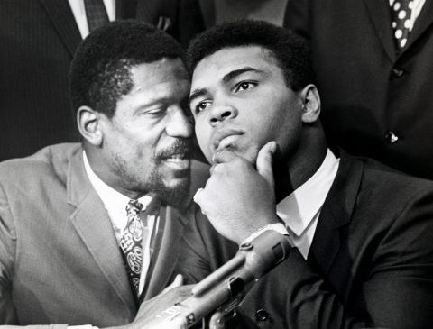 Russell, left, speaks with boxer and fellow civil rights trailblazer Muhammad Ali, in Cleveland, Ohio, on June 4, 1967, during a news conference in support of Ali's refusal to fight in the Vietnam War.