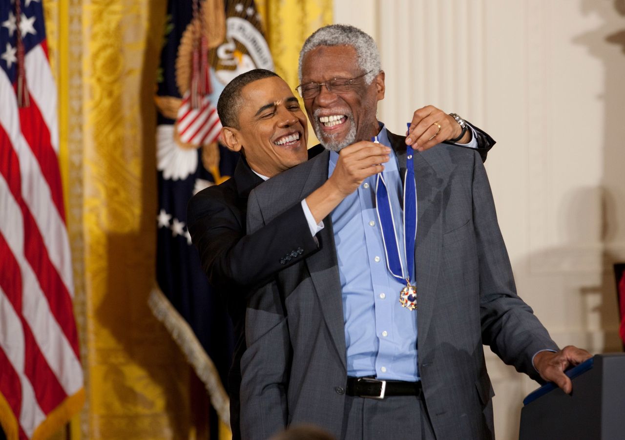 Then-President Barack Obama awards Russell the Presidential Medal of Freedom during a ceremony at the White House in Washington, DC, in February 2011.