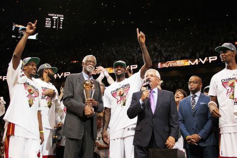 Russell looks on as then-NBA Commissioner David Stern presents Miami forward LeBron James with the Bill Russell NBA Finals Most Valuable Player Award in June 2012. In 2009, the NBA renamed the Finals MVP Trophy to include Russell's name.