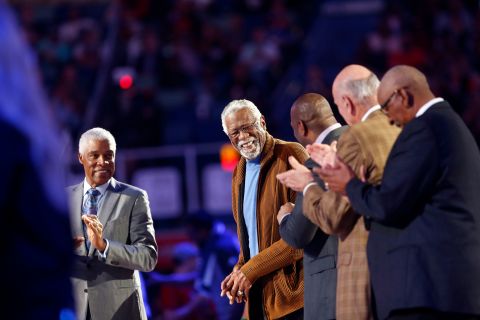 Russell, center, smiles as he is introduced with fellow legends Julius Erving, left, Magic Johnson, Bob Pettit and Willis Reed during the NBA All-Star basketball game in New Orleans, Louisiana, on Sunday, February 19, 2017. 
