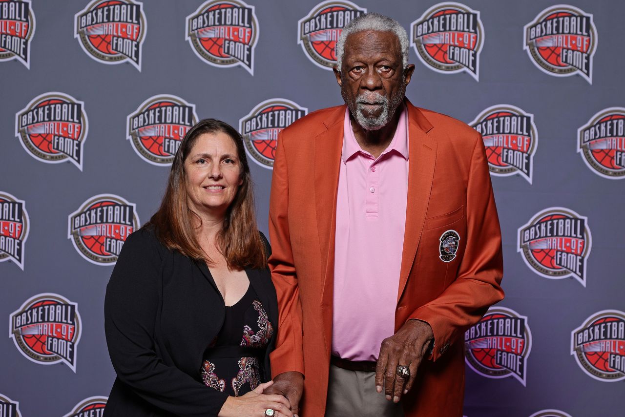 Russell poses for a photo with his fourth wife, Jeannine, at an awards gala in Uncasville, Connecticut, a day before the 2021 Naismith Memorial Basketball Hall of Fame enshrinement ceremony. Russell, who was inducted into the Hall of Fame as a player in 1975, was inducted as coach in September 2021.