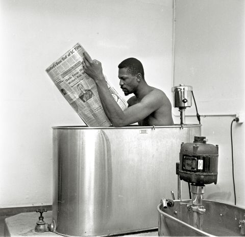 Russell relaxes in a whirlpool bath following a Celtics practice in San Francisco, California, in December 1963. 