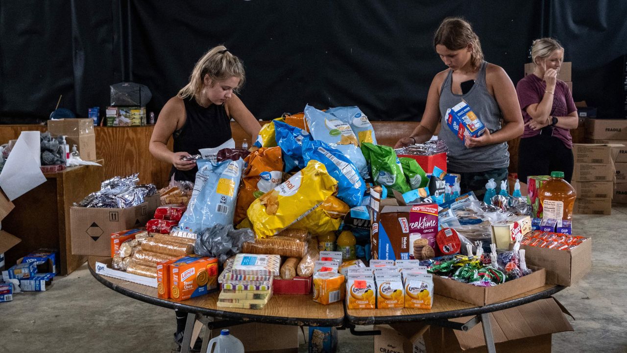 Volunteers work at a distribution center of donated goods in Buckhorn, Kentucky.