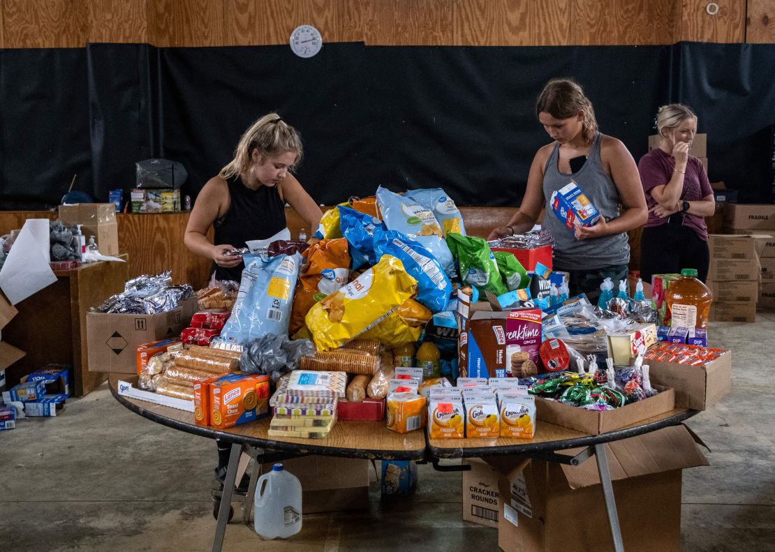 Volunteers work at a distribution center of donated goods in Buckhorn, Kentucky.