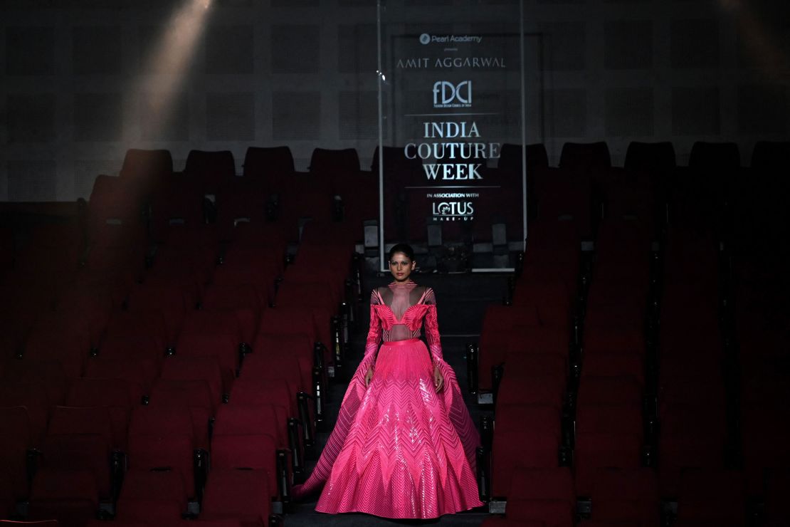 A model presents a creation by designer Amit Aggarwal during the FDCI India Couture Week in New Delhi on July 30, 2022. 