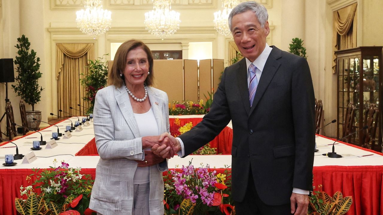 US House Speaker Nancy Pelosi shakes hands with Singapore's Prime Minister Lee Hsien Loong in Singapore on August 1.