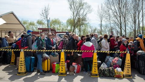 Ukrainian refugees are seen waiting to cross the border at the Palanca crossing between Ukraine and Moldova, on April 9, 2022.
