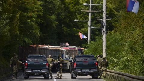 NATO soldiers are seen at a road barricade near the town of Zubin Potok, Kosovo on Monday. 
