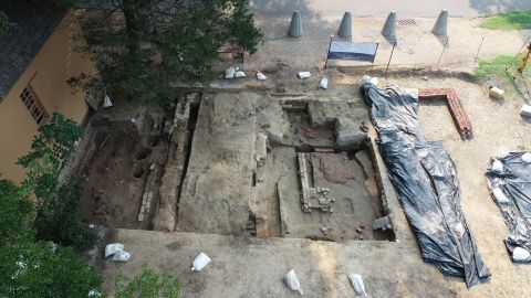 View of excavations showing the brick foundations for the 1856 church and the much smaller brick foundations for the first church building.