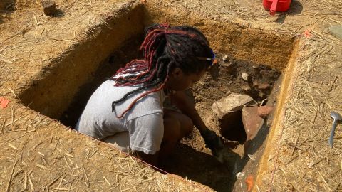 Colonial Williamsburg archaeological field technician DéShondra Dandridge works at the excavation site of First Baptist Church's original permanent location in September 2020.