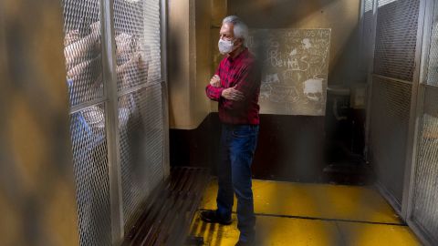 Award-winning journalist Jose Ruben Zamora stands inside a cell after a court hearing in Guatemala City on Saturday, July 30, 2022.