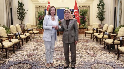 US House Speaker Nancy Pelosi, left, and Singapore President Halimah Yacob shake hands at the Istana Presidential Palace in Singapore, Monday, Aug. 1.