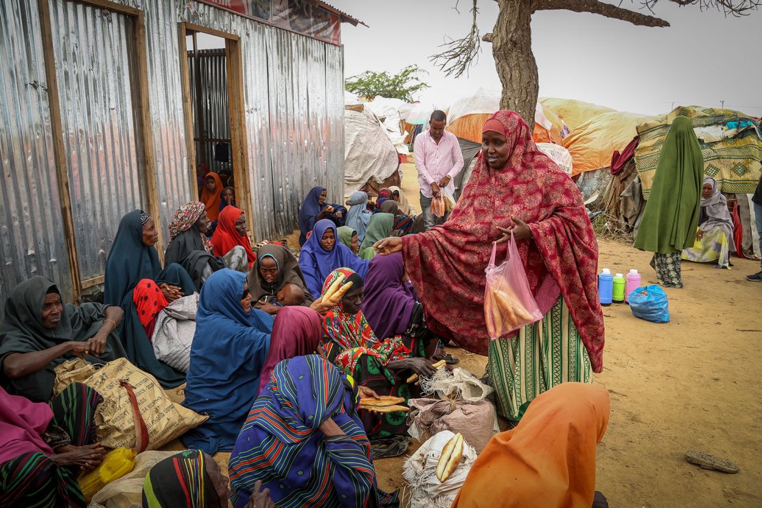 Somalis who fled drought-stricken areas receive food donations from city residents.