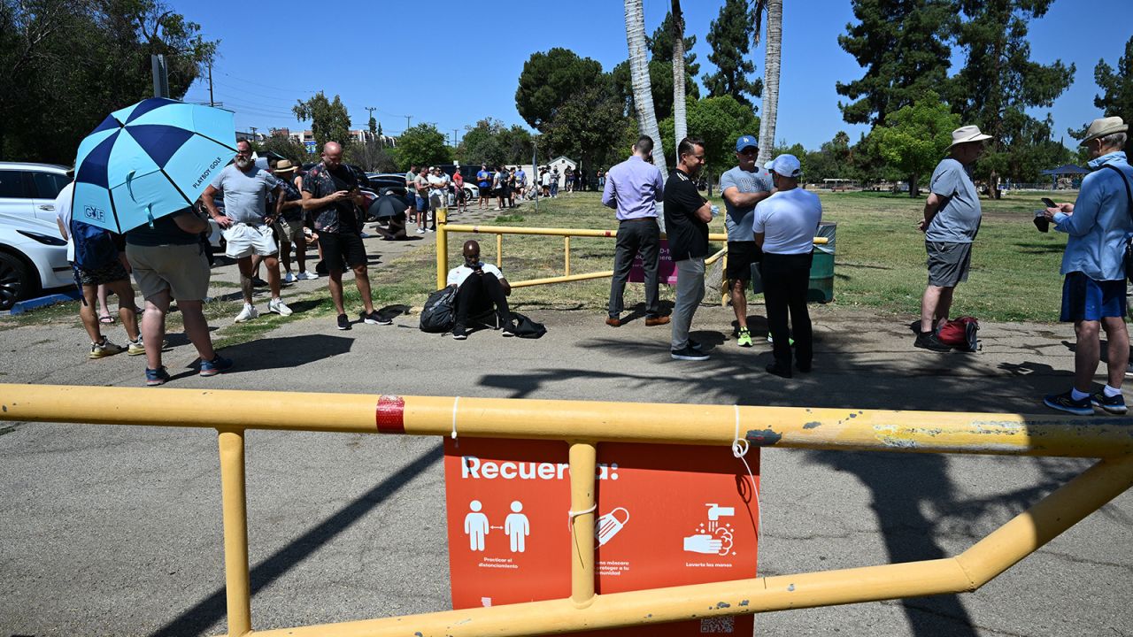 People line up to receive the monkeypox vaccine at a vaccination site at the Balboa Sports Center in the Encino neighborhood of Los Angeles, California, on July 27, 2022. 