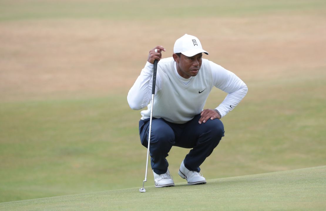 Woods prepares a shot during his second round at the 150th Open at St. Andrews.