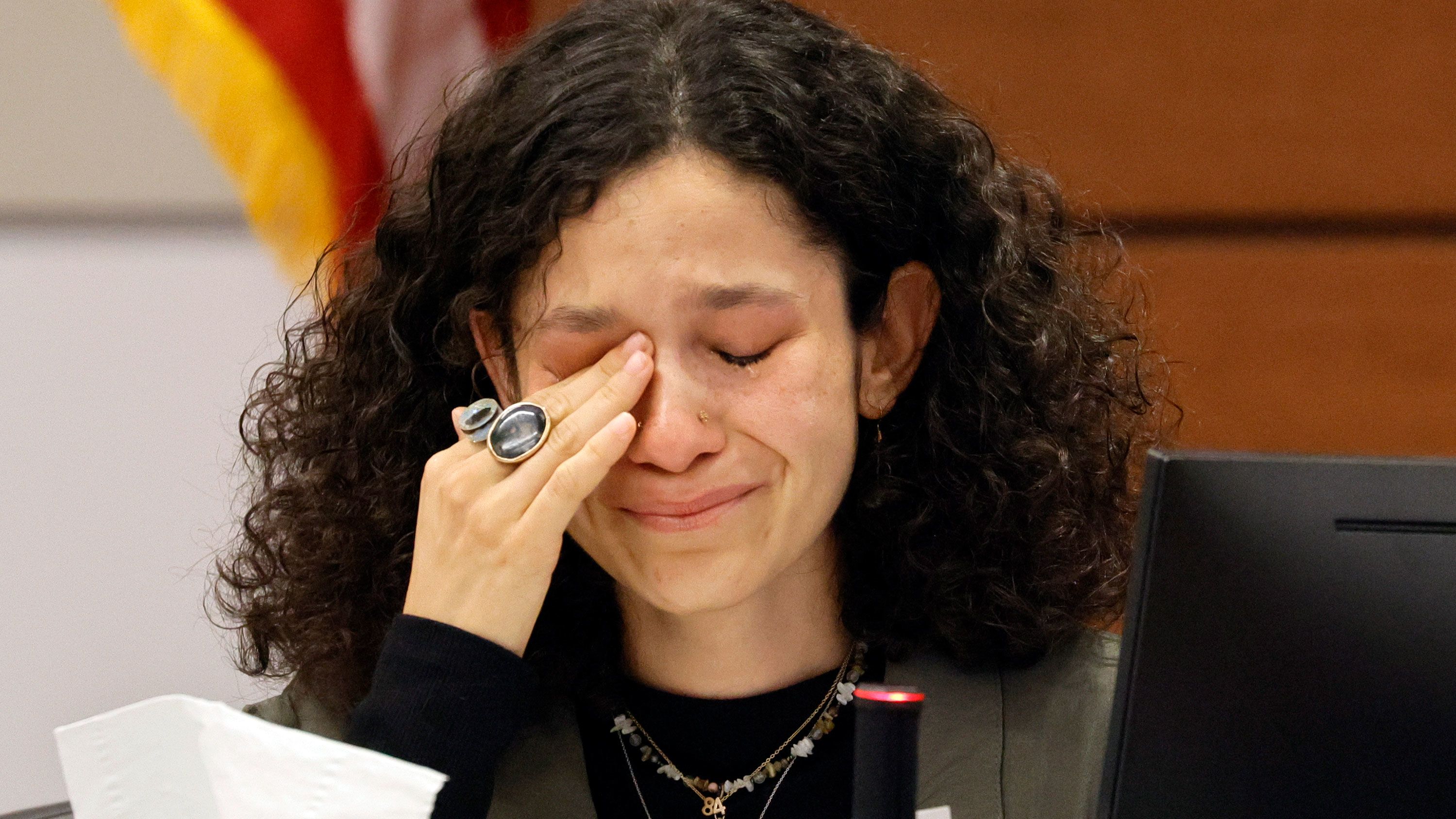 Victoria Gonzalez, who has been called Joaquin Oliver's girlfriend but said they called themselves "soulmates," wipes away tears as she gives her victim impact statement.
