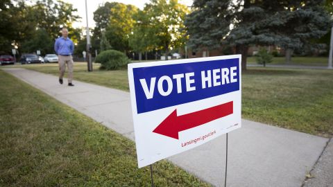 A voter arrives at a polling location to cast his ballot in the Michigan Primary Election on August 2, 2022 in Lansing, Michigan. 