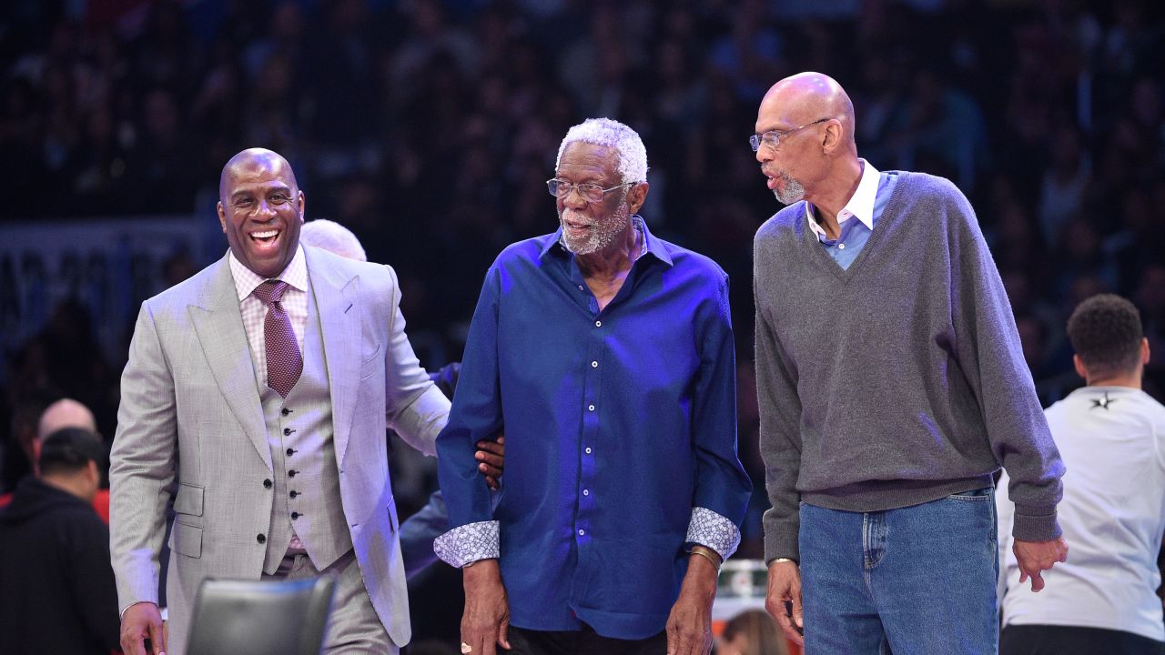 From left to right, Magic Johnson, Bill Russell and Kareem Abdul-Jabbar attend the NBA All-Star Game in February 2018 at Staples Center in Los Angeles. 