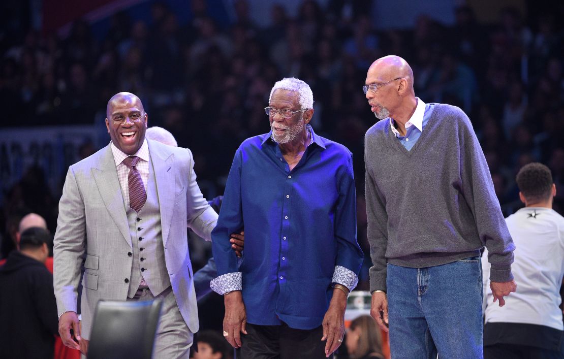 From left to right, Magic Johnson, Bill Russell and Kareem Abdul-Jabbar attend the NBA All-Star Game in February 2018 at Staples Center in Los Angeles. 