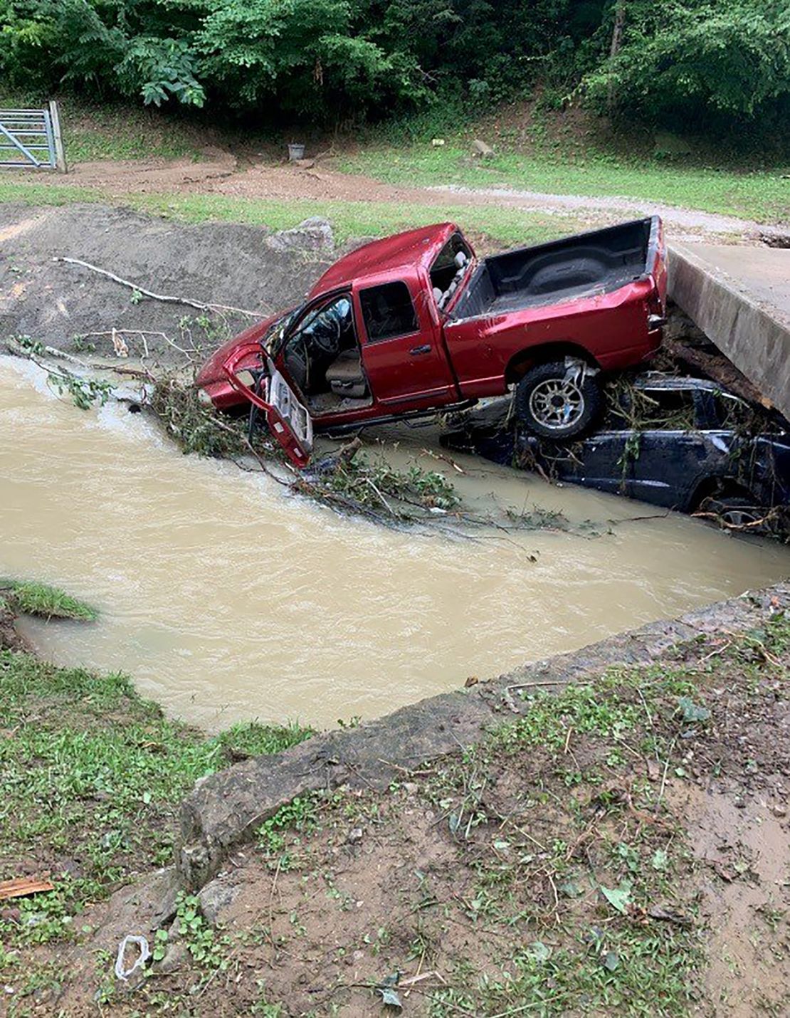 Hensley disappeared after his red truck was swept away by flood waters.