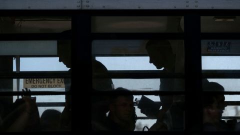 Ukrainians seeking  asylum in the United States are seen on a bus  in Tijuana, Mexico, in April. Since Russia's invasion of Ukraine began, some 100,000 Ukrainians have come to the United States through various immigration channels. Officials say a recently reported phishing scam targeted prospective US-based sponsors trying to help Ukrainians.