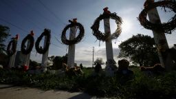 A memorial honors the six victims of a shooting at a Sikh Temple in Oak Creek, Wisconsin, August 7, 2012.  The gunman who killed six worshipers at a Sikh temple in Wisconsin was identified as a 40-year-old U.S. Army veteran and authorities said they were investigating possible links to white supremacist groups and his membership in skinhead rock bands. The assailant, shot dead by police at the scene on Sunday, was identified as Wade Michael Page. REUTERS/John Gress (UNITED STATES - Tags: CRIME LAW RELIGION)