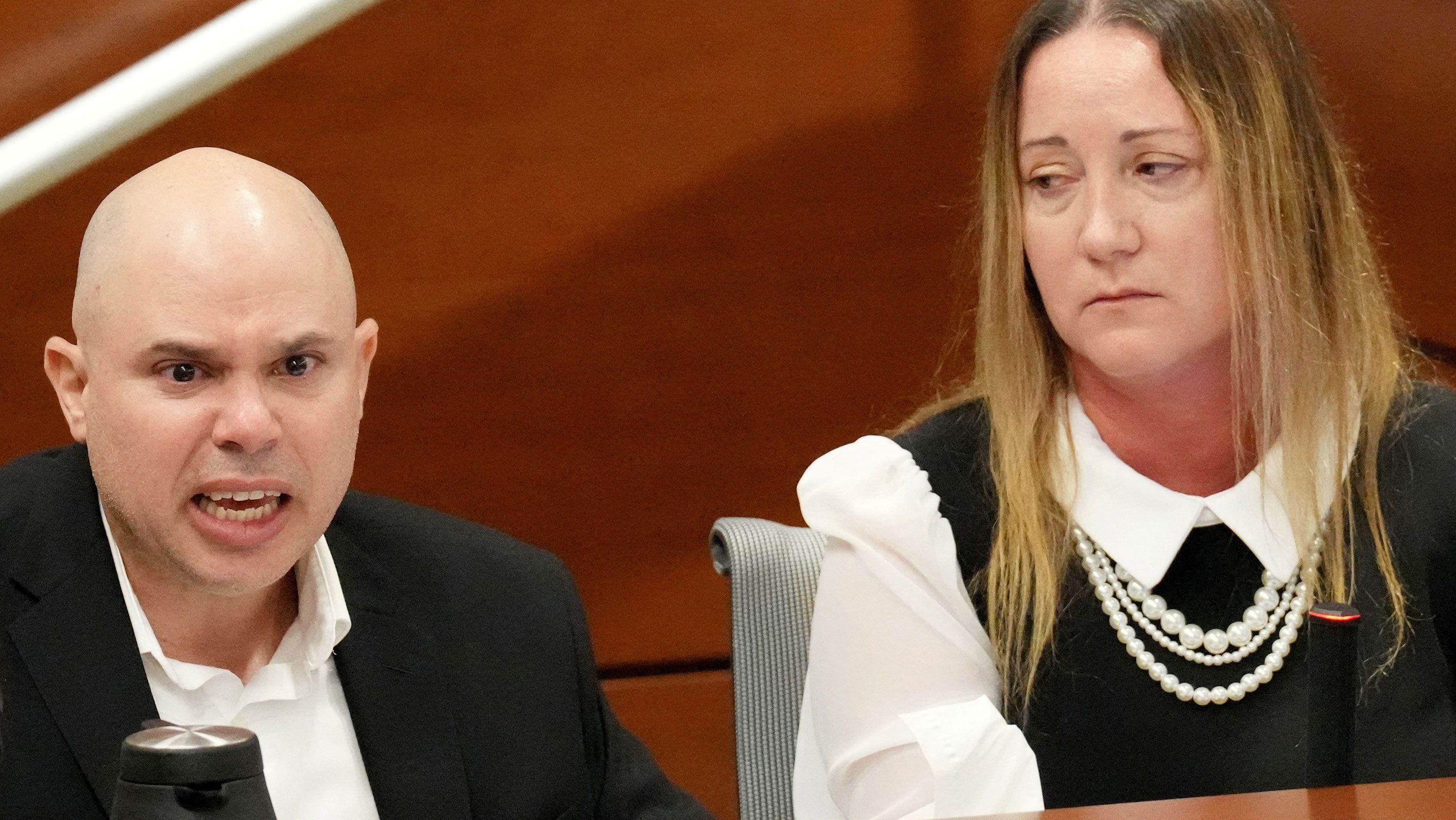 Lori Alhadeff looks toward her husband Ilan Alhadeff as he delivers a victim impact statement during the penalty phase of the Parkland school shooter's trial. 