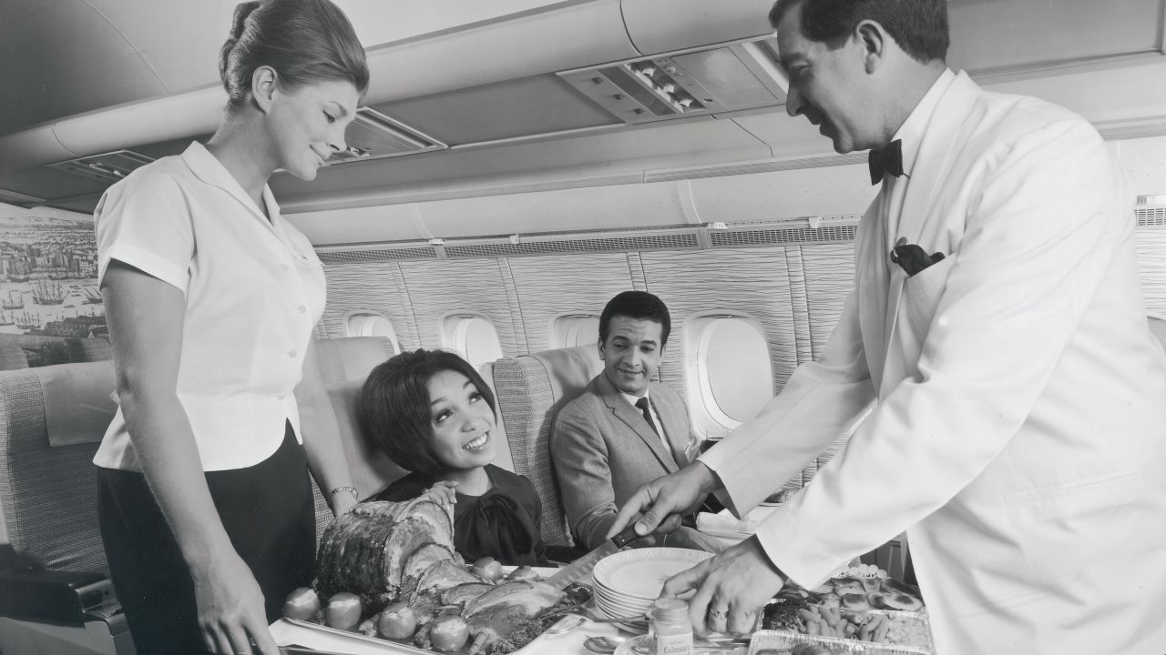 Sunday roast is carved for passengers in first class on a BOAC VC10 in 1964.